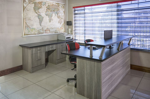 Normandy fusion melamine office desk and storage unit with a stacked granite worktop.