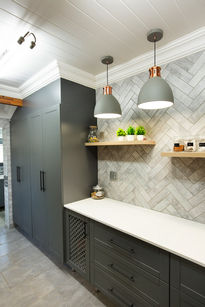 storm grey quaker wrap kitchen with solid wood floating shelves and a lattice base unit
