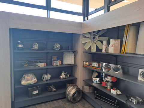 Greythorne fusion double display box encasing a steel frame structure for shelving units on display.