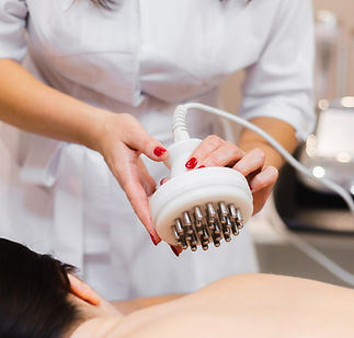 girl-spa-salon-receives-back-neck-massage-lies-cosmetology-table-relaxed-enjoys-process_ed