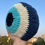 Thumbnail: Crochet Evil Eye Cushion Side View