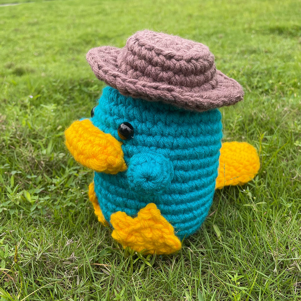 Thumbnail: Crochet Phineas and Ferb's Perry the Platypus Soft Toy Side View
