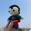 Thumbnail: Crochet Mini Superman Figurine Semi Side View