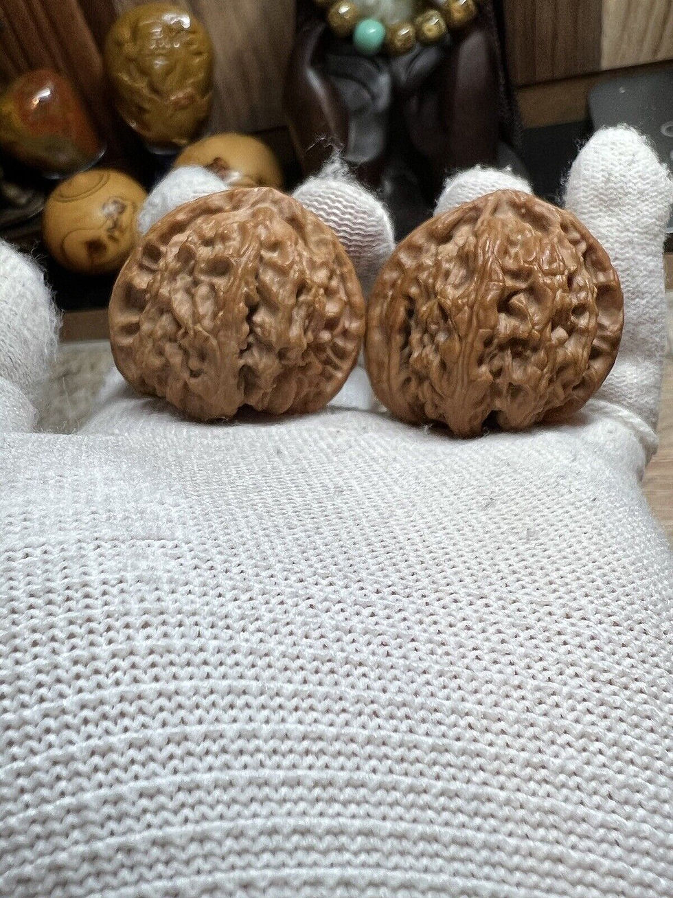 Thumbnail: Matched Chinese Health Walnuts - Triangular White Lion Design