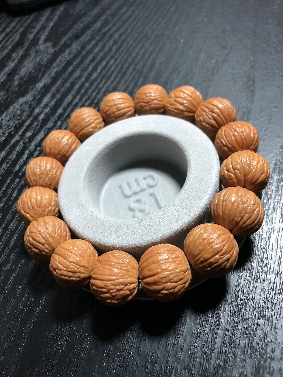 Thumbnail: Luxurious Hedgehog Walnut Phoenix Feather Bracelet