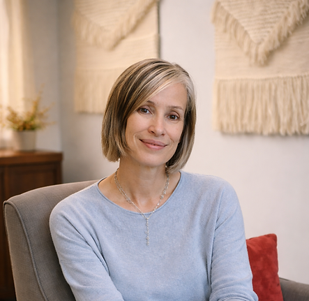 Kristine in a warm therapy setting.png