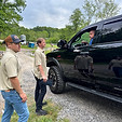 Silo Cinema staff greeting guests who arrived in a black pickup truck