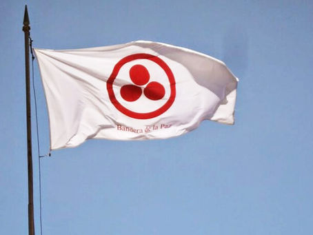 La Bandera de la Paz: un círculo y tres puntos que protegen la cultura y el alma del mundo