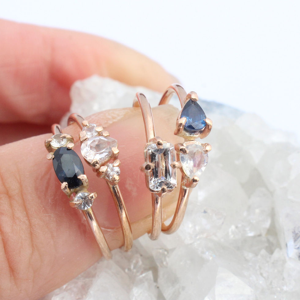 Thumbnail: EMERALD CUT WHITE SAPPHIRE STACKING RING with other rings