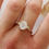 Thumbnail: oval moonstone dotty ring on finger