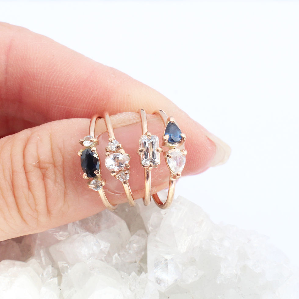 a selection of 9CT GOLD MORGANITE AND SAPPHIRE CLUSTER RING