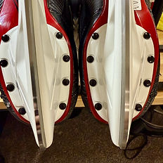 close-up difference of polished (left) vs. unpolished (right) hockey skate blades