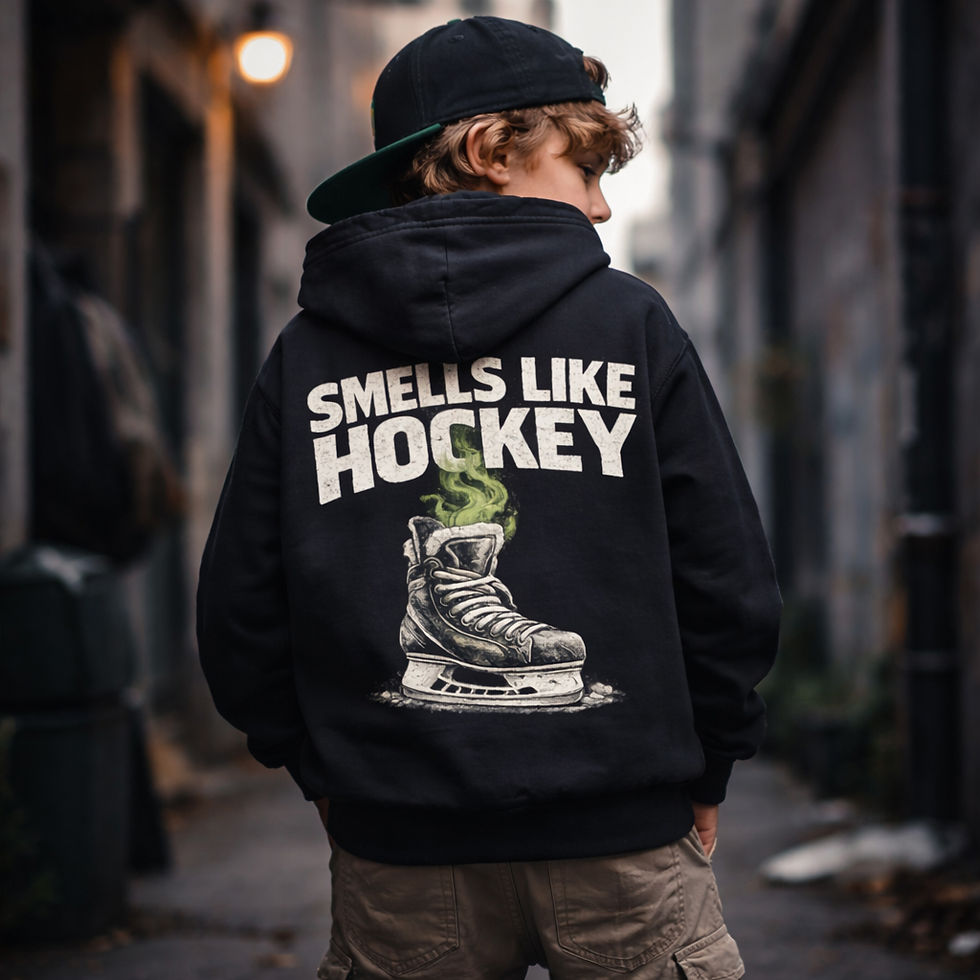 Back view of boy wearing black Smells Like Hockey youth hoodie with hockey skate graphic