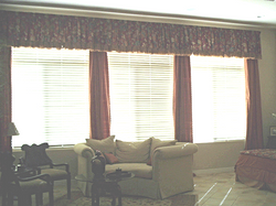 Custom curved couch and drapes