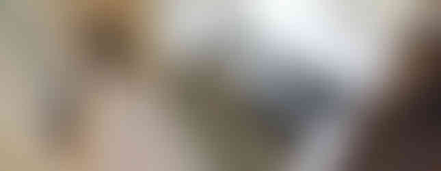 A kitchen in Bizen City, Okayama Prefecture, featuring a stove, sink, and dining table, showcasing a functional layout.