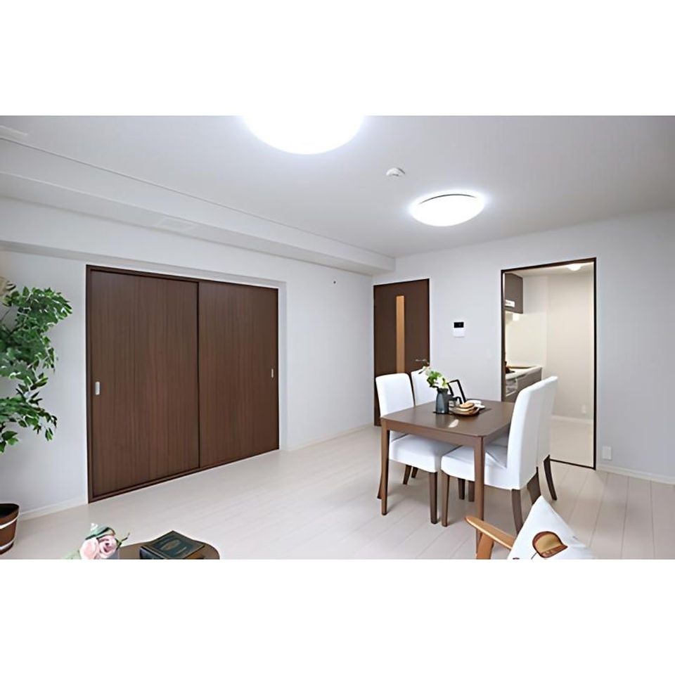 Bright, airy living and dining room with modern accents.