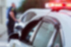 A police officer pulling someone over