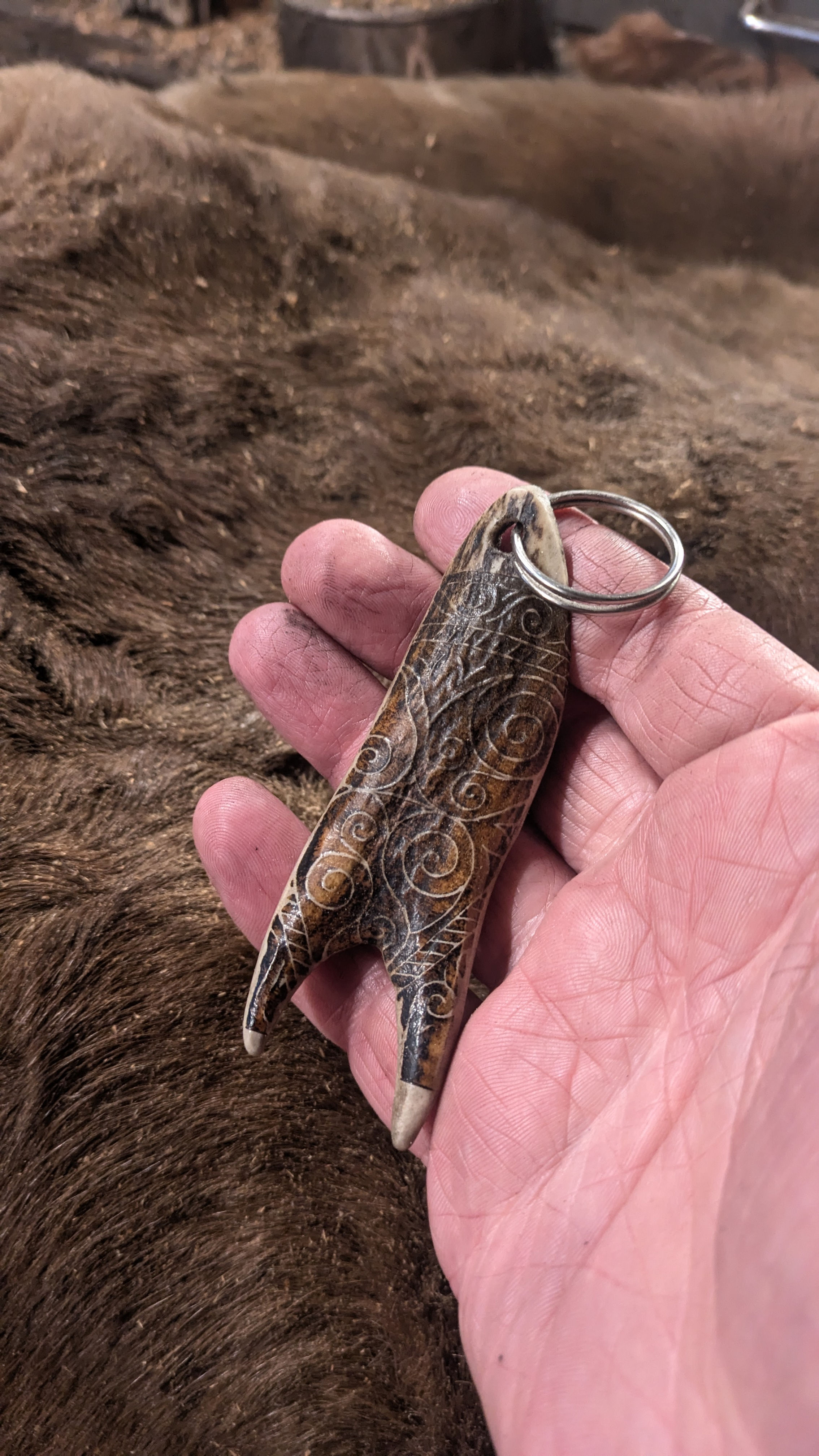 norse design on red deer antler prong