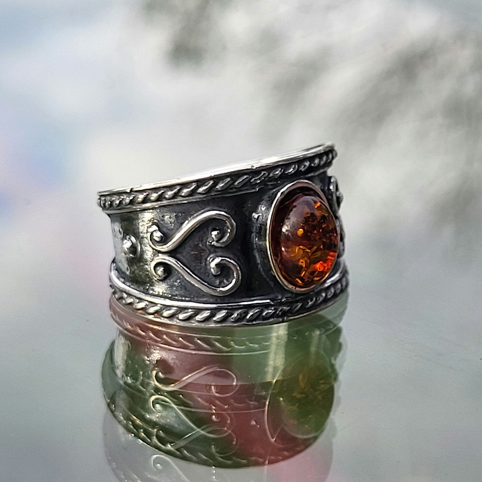 Miniature : Bague "Le cœur" en ambre et argent 925‰ /vue trois quart