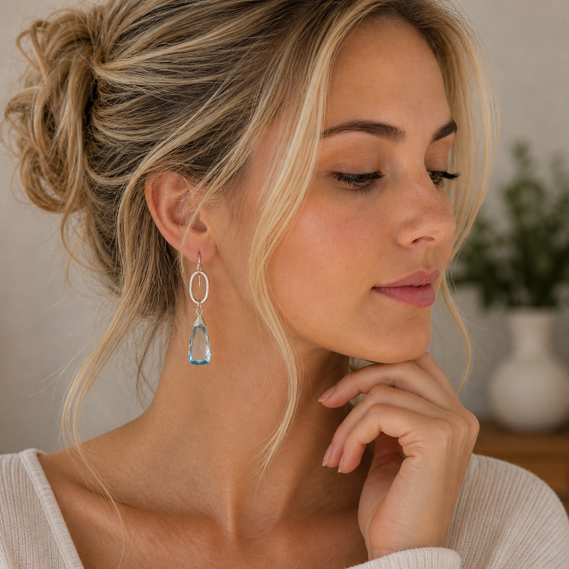 Boucles d'oreilles "Souffle d'eau" en topaze bleue et argent 925‰