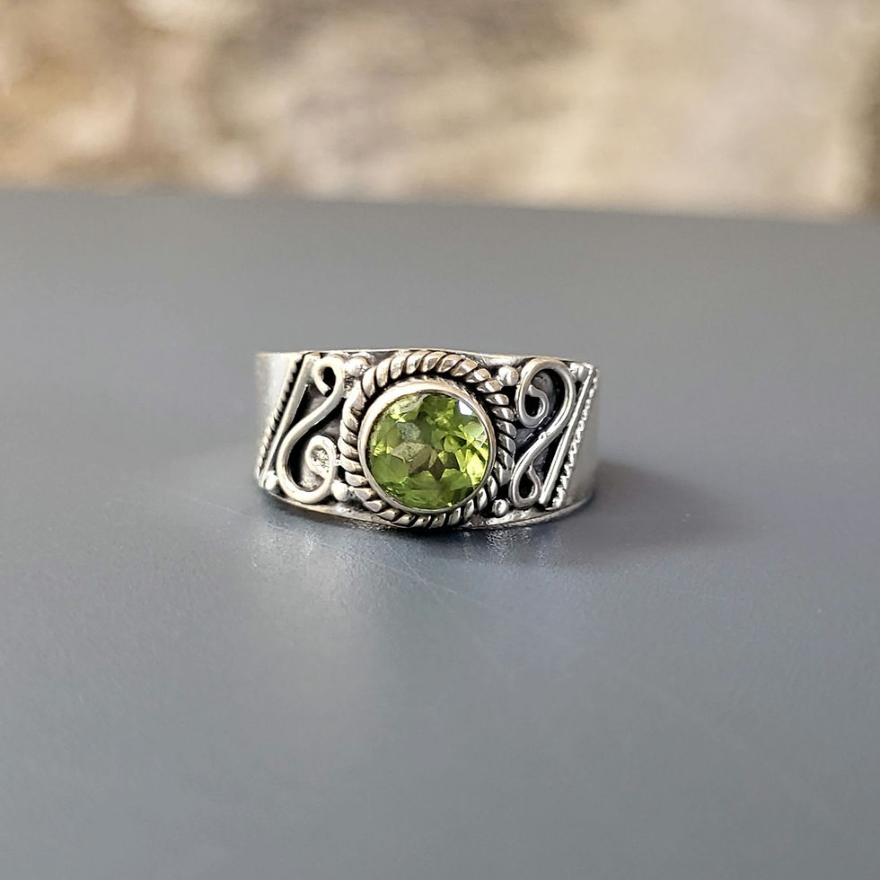 Bague péridot rond sur argent 925‰/vue de face