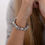 Miniatura: bracelet sur élastique en aluminium/olives/rondelles