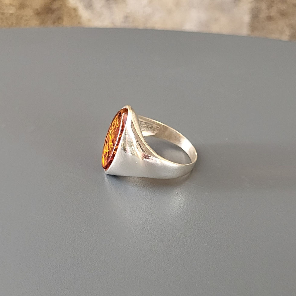 Miniature : Bague en ambre ovale miel et argent 925‰. 