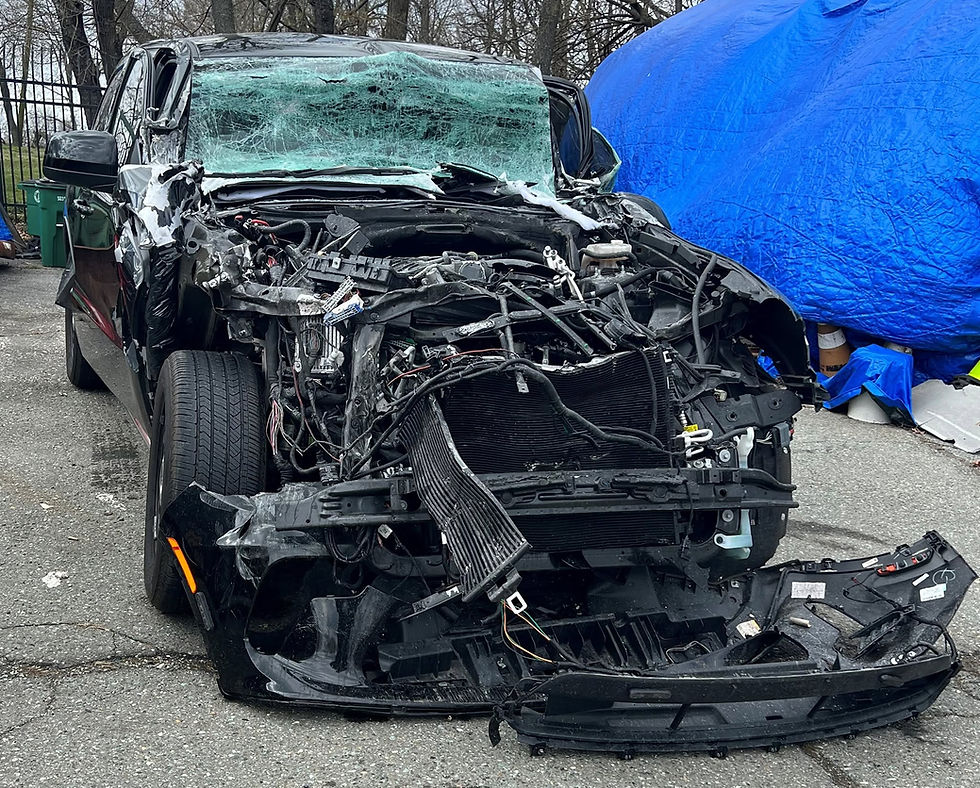 Image of Dodge Durango police truck with extensive damage from crash