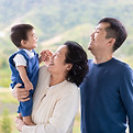 asian-grandmother-is-holding-the-little-baby-boy-g-2024-11-27-09-48-05-utc.jpg
