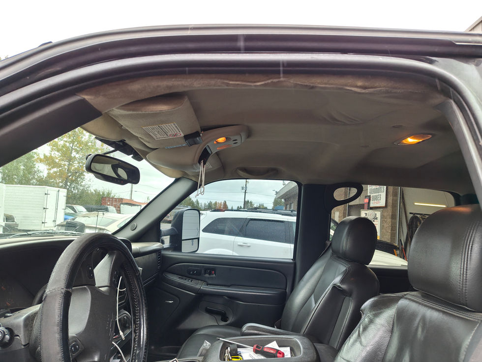 Before photo 1 of the GMC 2500 headliner with some sagging and tears