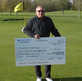 Steve with Cheque.JPG