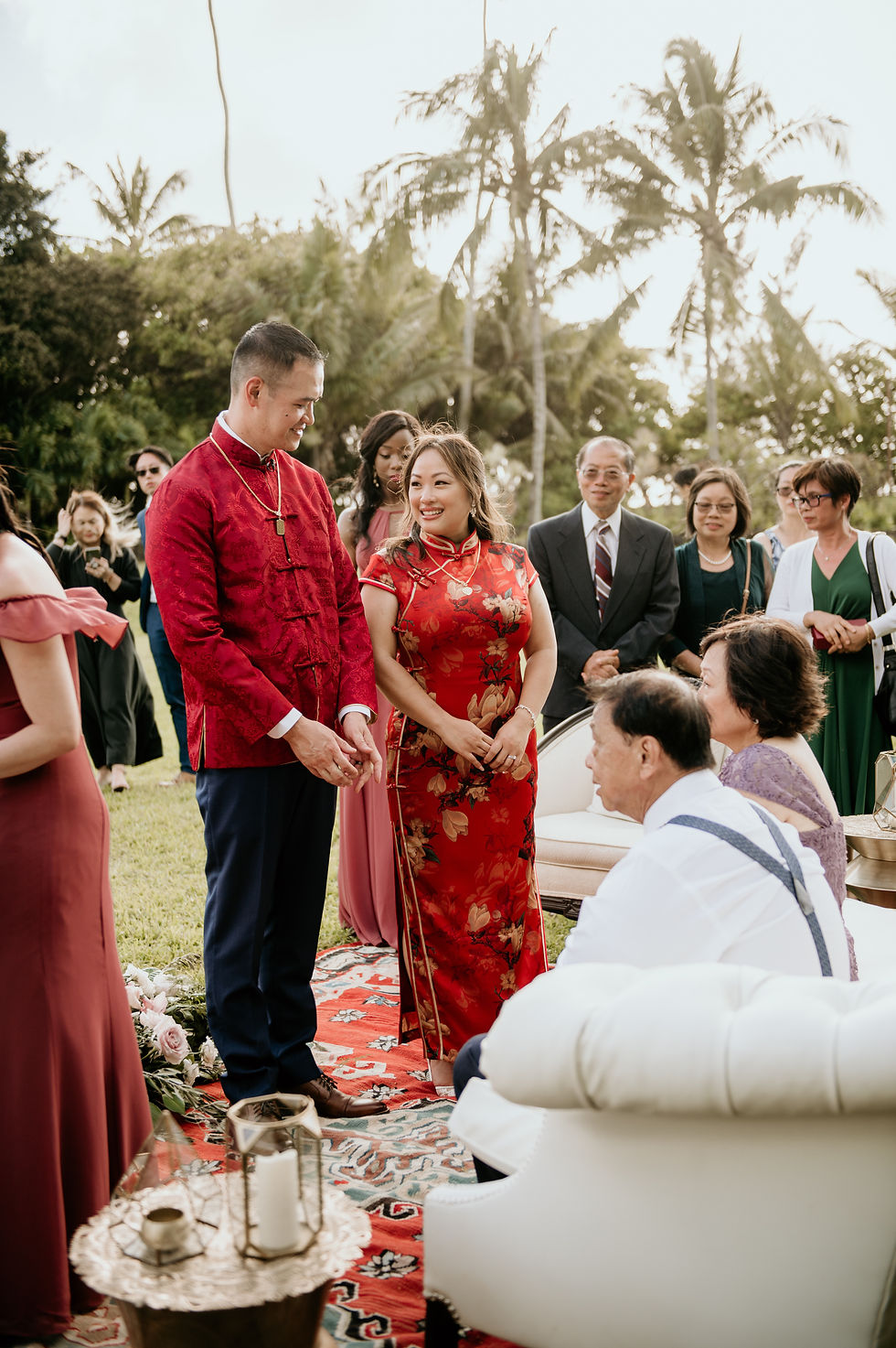 Chinese couple in red attire at Vancouver tea ceremony