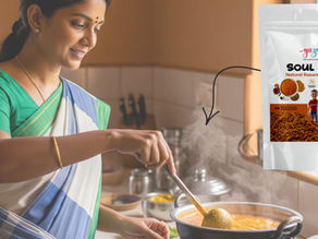 The women cooking with a packages of soul sip rasam powder