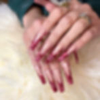 Long acrlyic nails with heart design