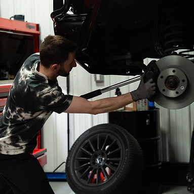 Aaron Gibson performing AMG upgrade at Eminent Motorsports