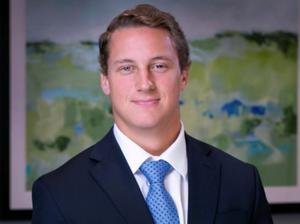 Matt Worthington in a suit and blue tie