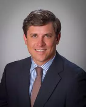Brent F. Hayes headshot in a suit and tie
