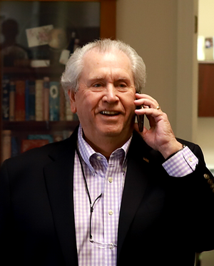 Mark I. Conway speaking on his cell phone