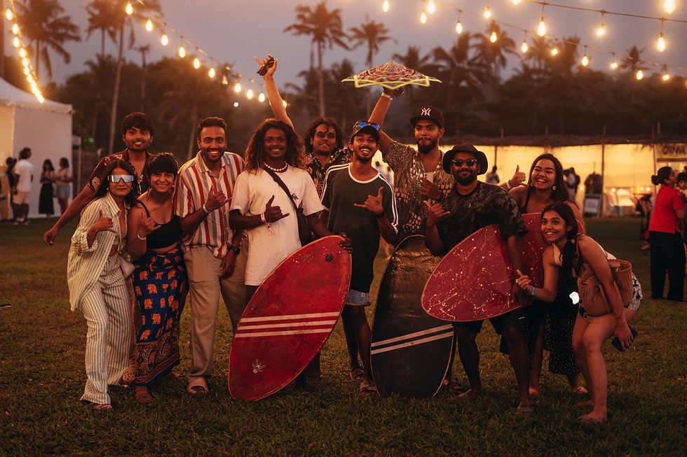fun group of people with skimboards at a party in varkala