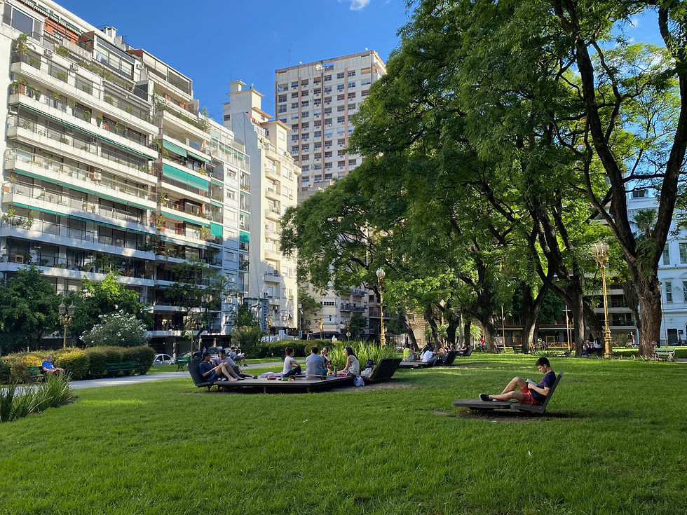 People lounging in the park near my old apartment.