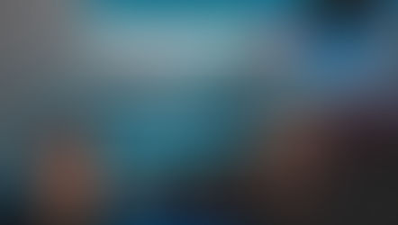 A hand on fabric with text reading "We protect and promote human rights."