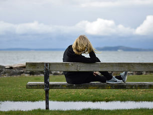 Person standing calmly in nature, symbolizing healing from shame and trauma through EMDR therapy in Vancouver and online across BC.