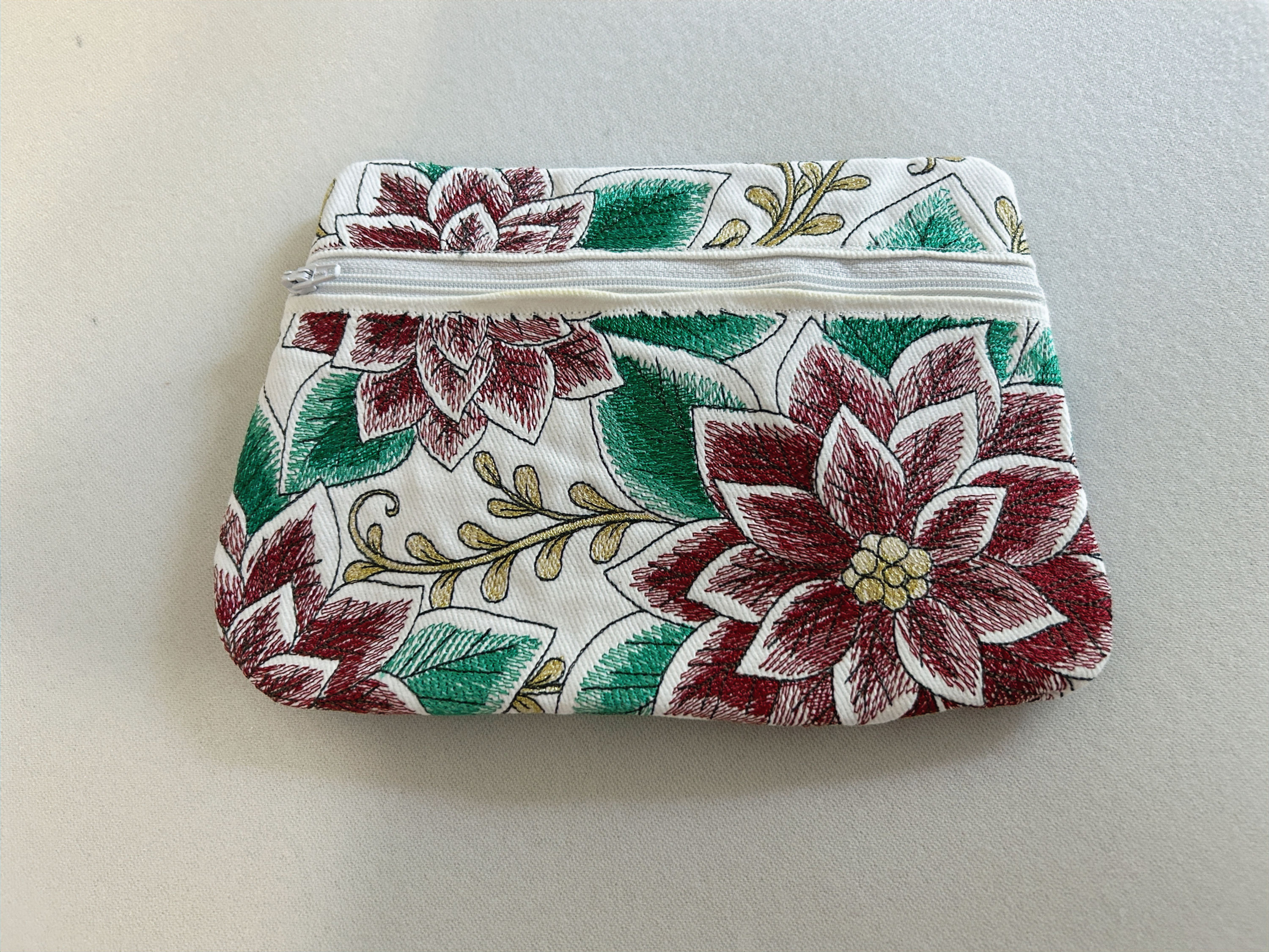 Poinsettia zipper clutch
