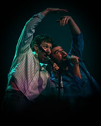 jack and will make a heart with their hands while they sing into the mics