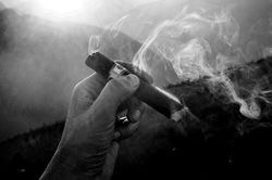 smoke coming from cigar