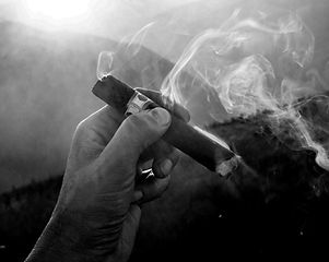 smoke coming from cigar