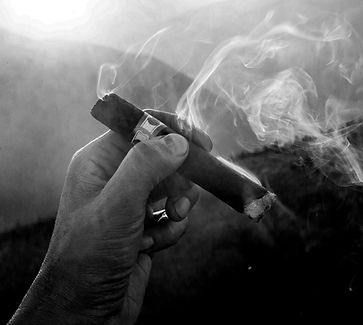 smoke coming from cigar
