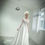 Thumbnail: White tulle beaded bridal gown