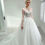 Thumbnail: Satin and tulle bridal gown with train