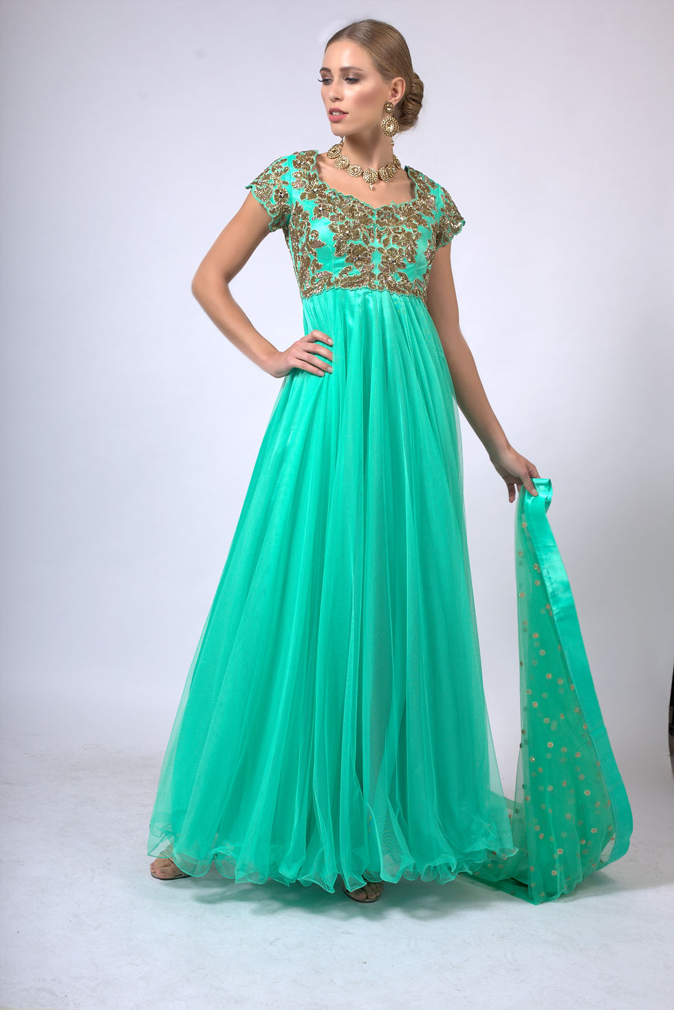 Thumbnail: Green tulle gown with hand embroidery